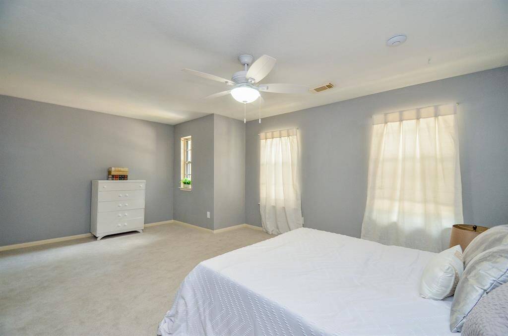 2ND BEDROOM UPSTAIRS IS VERY LARGE, HAS A SITTING AREA AND CAN BE USED AS SECOND PRIMARY BEDROOM