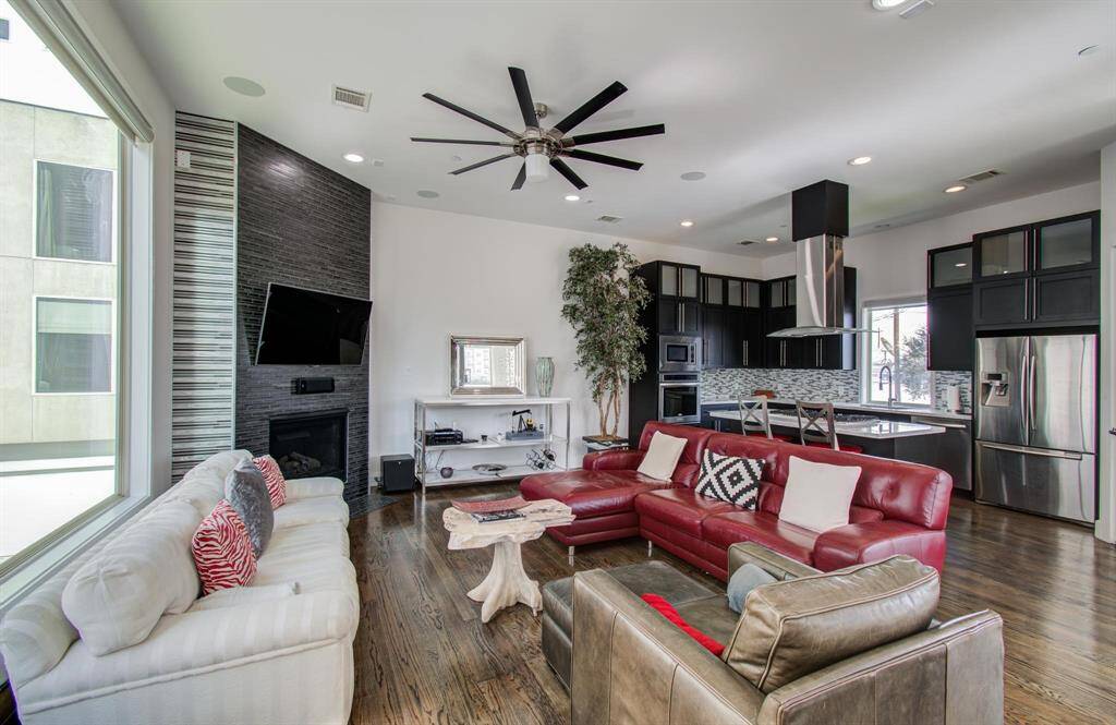 2nd floor living space with high ceilings, custom blinds and tons of natural light!