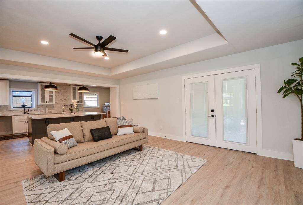 Living room opening to large covered back patio - great for entertaining.