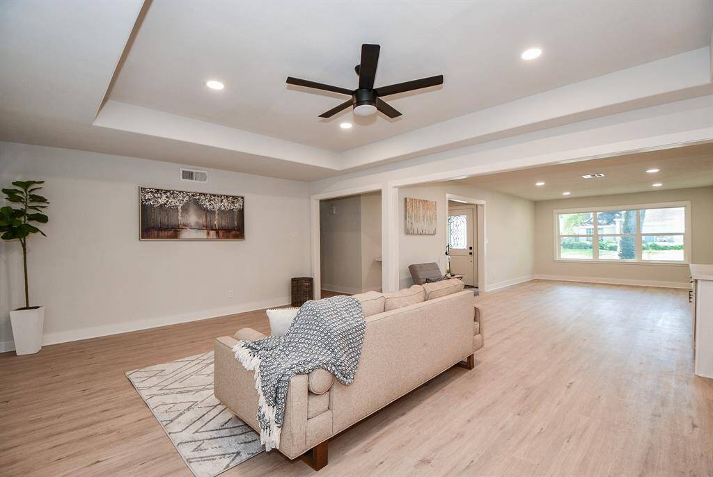 Spacious Living Room with raised ceiling.