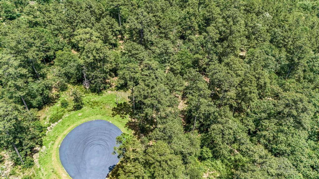 4468 Sayde Ridge is an oversized home site- one of the largest wooded lots in Bluejack National