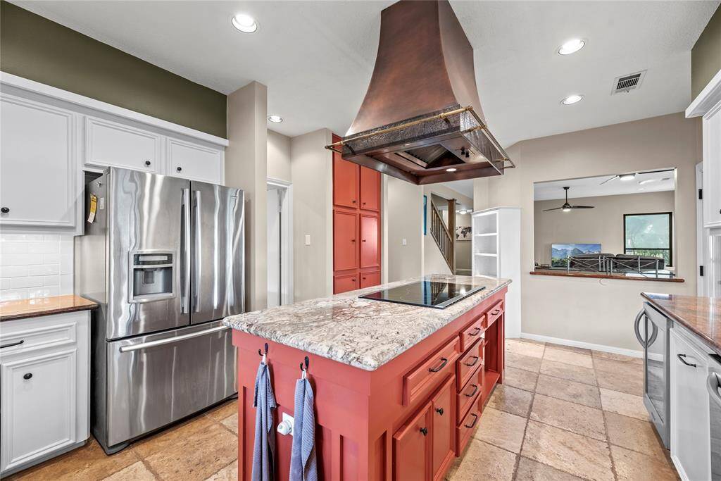 Access to the backyard from the kitchen is excellently placed. Open the door to tell your little buccaneers their pizza dinner has arrived!