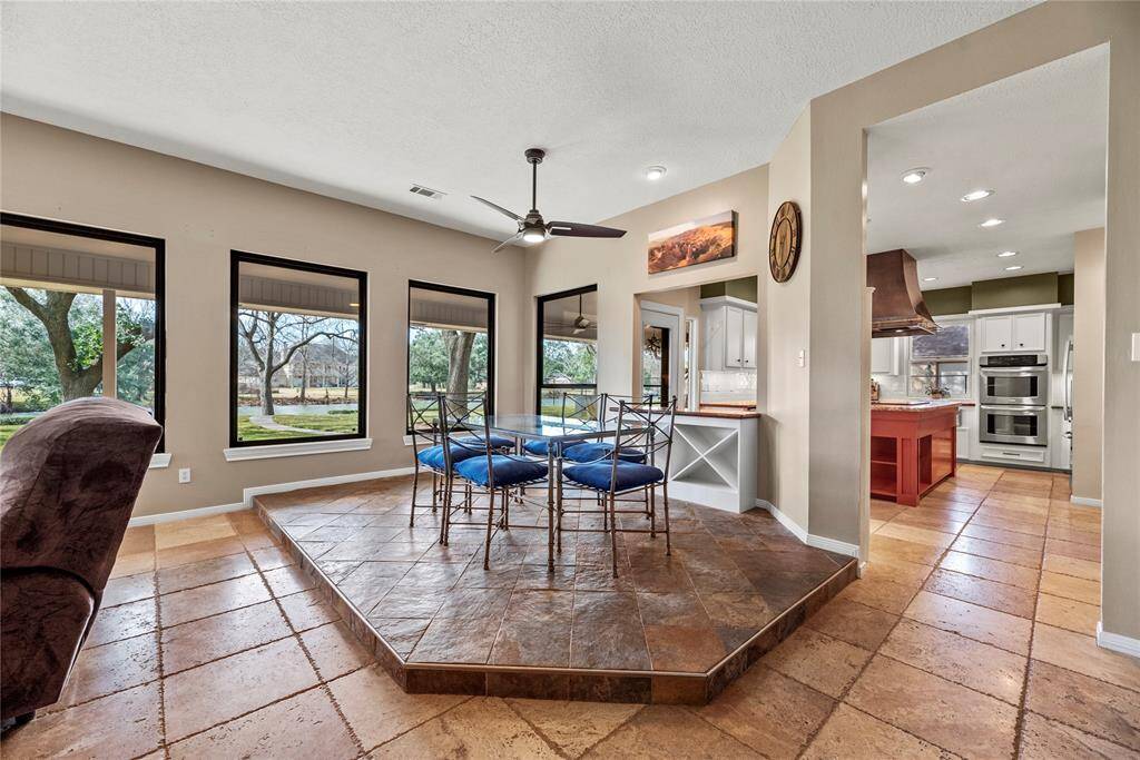Everyday dining is stylish and bright in the breakfast area. Eat heart-shaped waffles and sausage with the kiddos, as you admire the view of the backyard!
