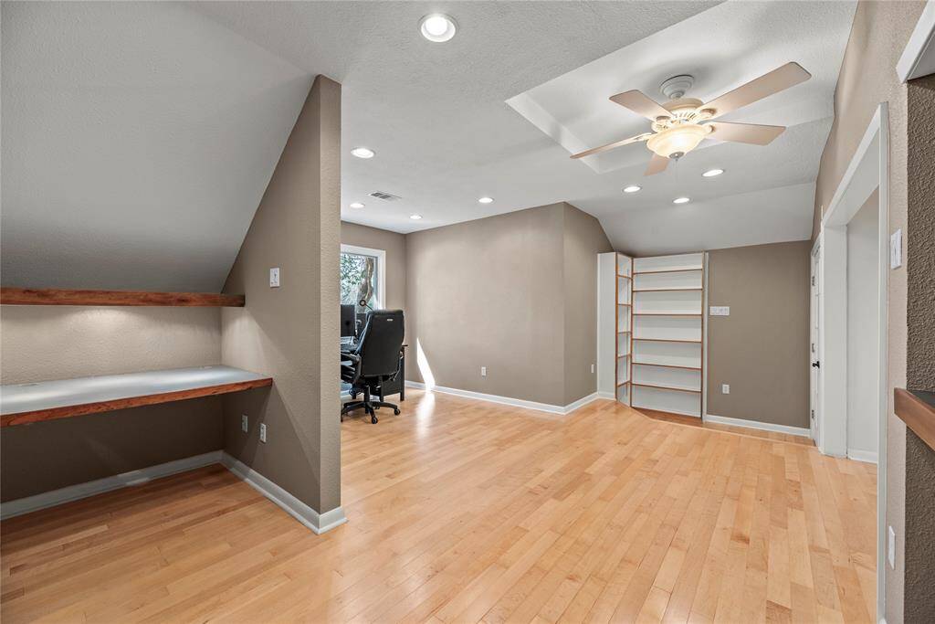 Operating a home office, doing homework, or managing household accounts may be easily accomplished upstairs with the custom built-in desks, shelving, and cabinetry. Organization is key to efficient learning and accomplishments, and these unique built-ins deliver!
