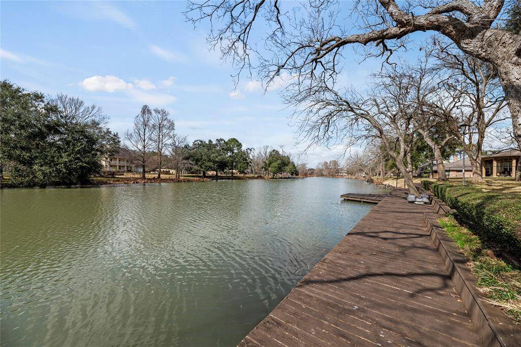 Step right out your back door to fish from your own dock, seamlessly extending along the property.