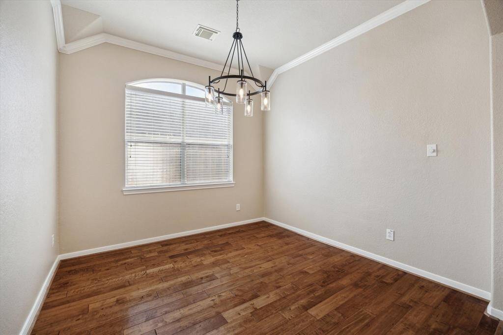 Formal dining room with upgraded fixture!!!