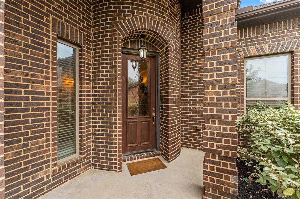 This cozy porch is a perfect welcoming to your guests.