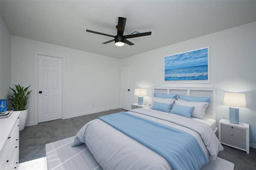 Virtually Staged: Secondary Bedroom with carpet floors, and a ceiling fan.