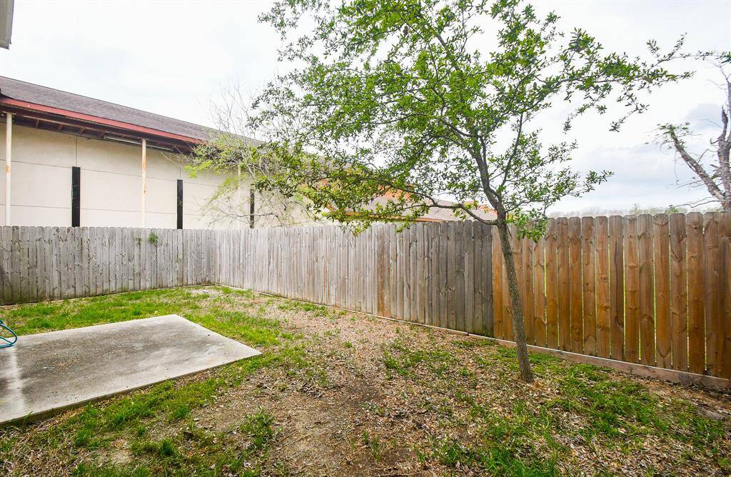 The front of the home features a classic brick exterior that adds charm and curb appeal. The property sits on a fully fenced lot with secure 360-degree fencing and a stylish iron sliding gate at the front. Enjoy private driveway access to a 2-car garage, which also includes a convenient built-in closet for additional storage.