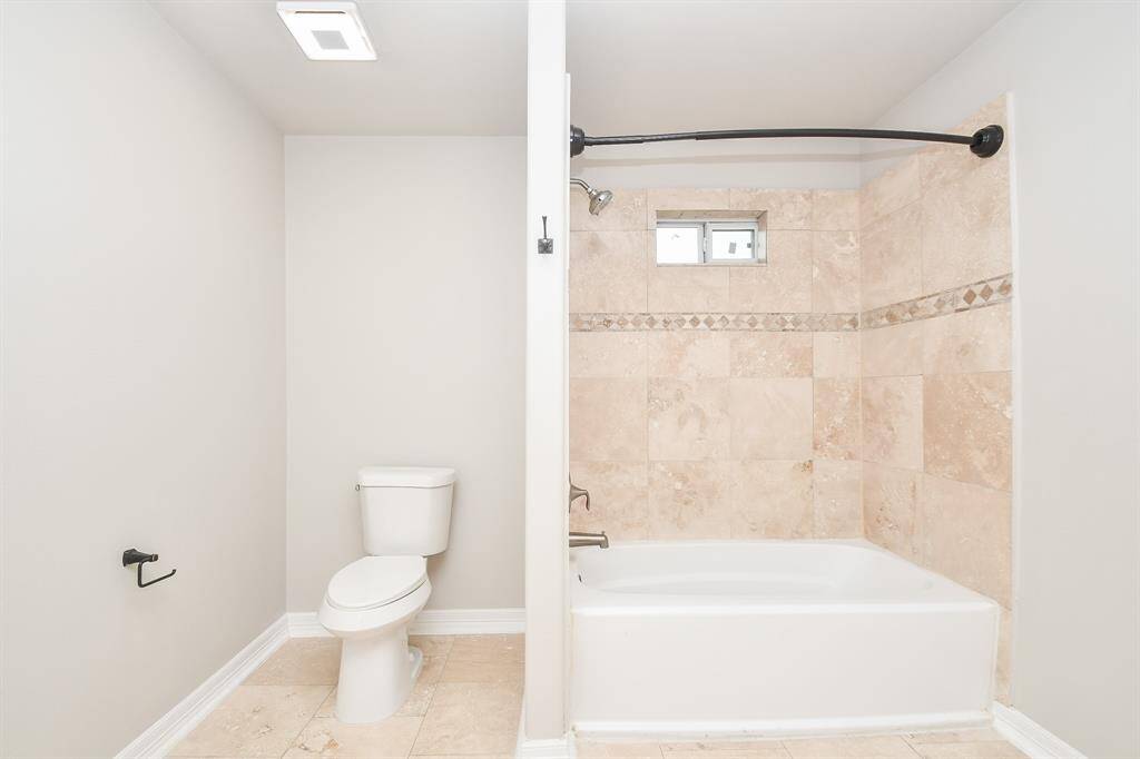 The primary bedroom overlooks the backyard, offering peace and privacy with no rear neighbors — perfect for quiet mornings or relaxing evenings