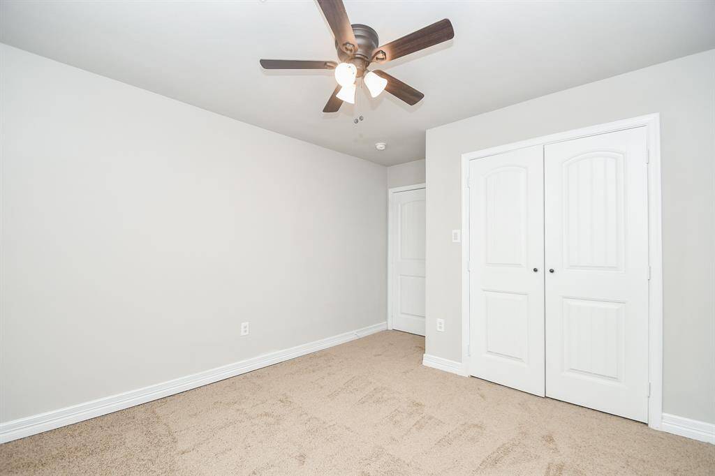 The primary bathroom offers a spacious retreat with double sinks, a large walk-in closet, and a built-in ceiling speaker — perfect for enjoying your favorite music while you get ready or wind down