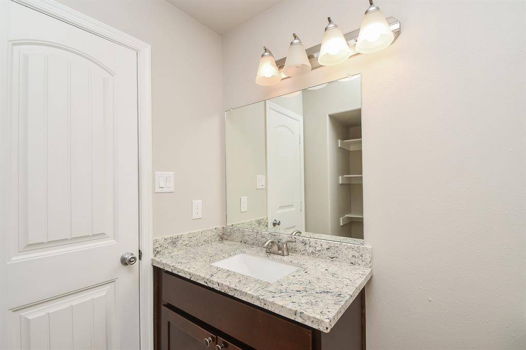 The primary suite includes a spacious, extended walk-in closet with plenty of room for clothing, shoes, and storage — offering the length and layout to keep everything organized and easily accessible.