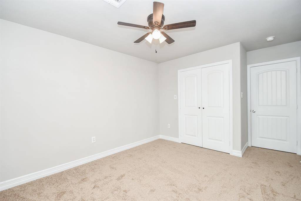 Both secondary bedrooms are generously sized and face the front yard, offering a bright and balanced layout perfect for children, guests, or a home office setup. Each room includes a roomy closet and neutral finishes, making them easy to style to your needs.