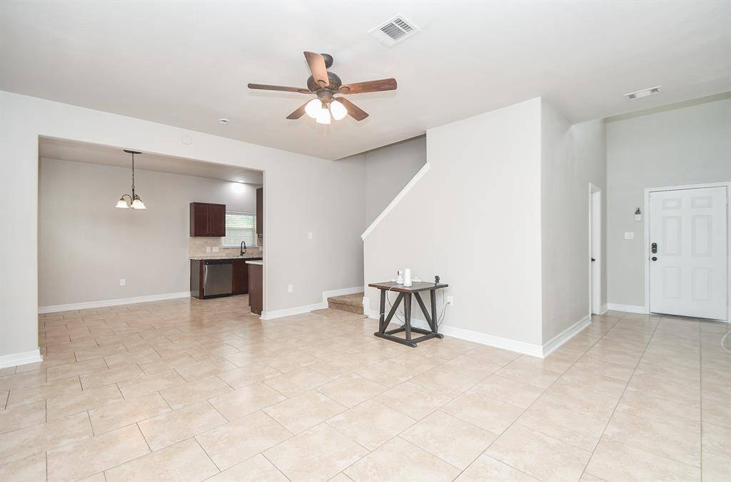 Conveniently located near the front entry, the half bath features a beautiful vessel bowl sink and modern finishes — a perfect blend of style and function for guests