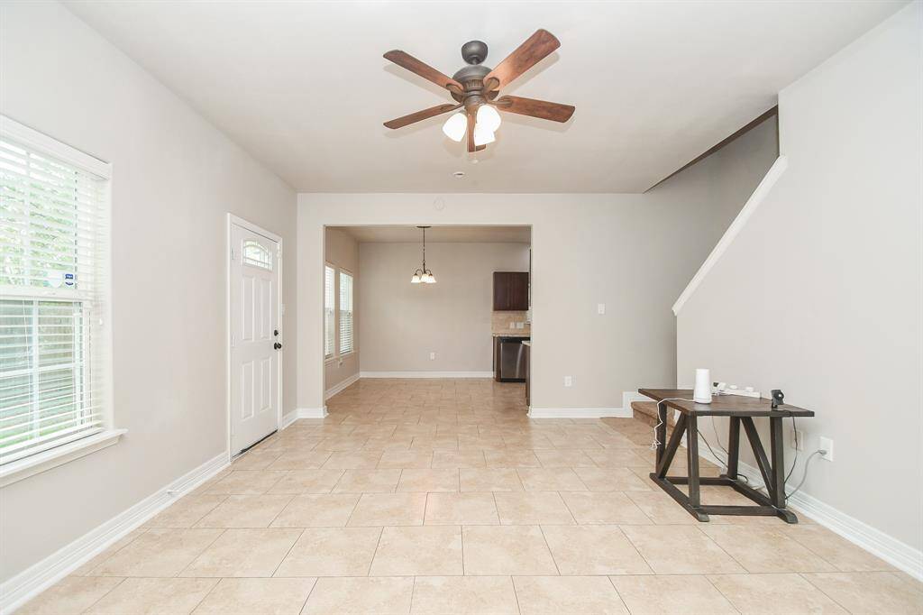 Conveniently located near the front entry, the half bath features a beautiful vessel bowl sink and modern finishes — a perfect blend of style and function for guests