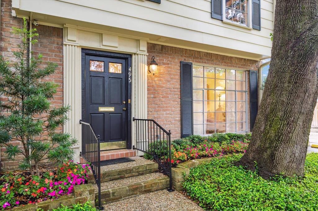 North Post Oak Lane is tucked away in a park-like setting on a gated tree-lined street .