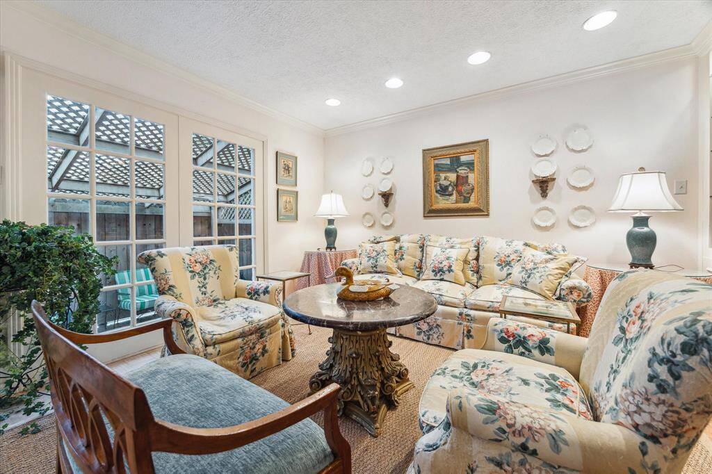 Also on the first floor is a large den overlooking the patio.