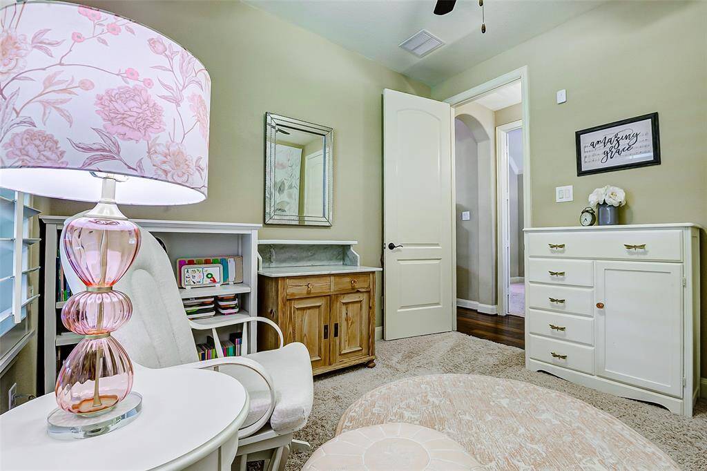 A ceiling fan enhances comfort and improves air circulation, keeping the room cool and comfortable year-round. The spacious walk-in closet offers generous storage, adding both convenience and functionality.