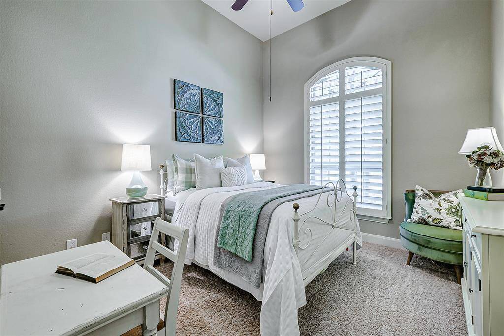 The third and final bedroom offers a 12ft. ceiling and a bright and airy atmosphere with a large window, complete with plantation shutters.