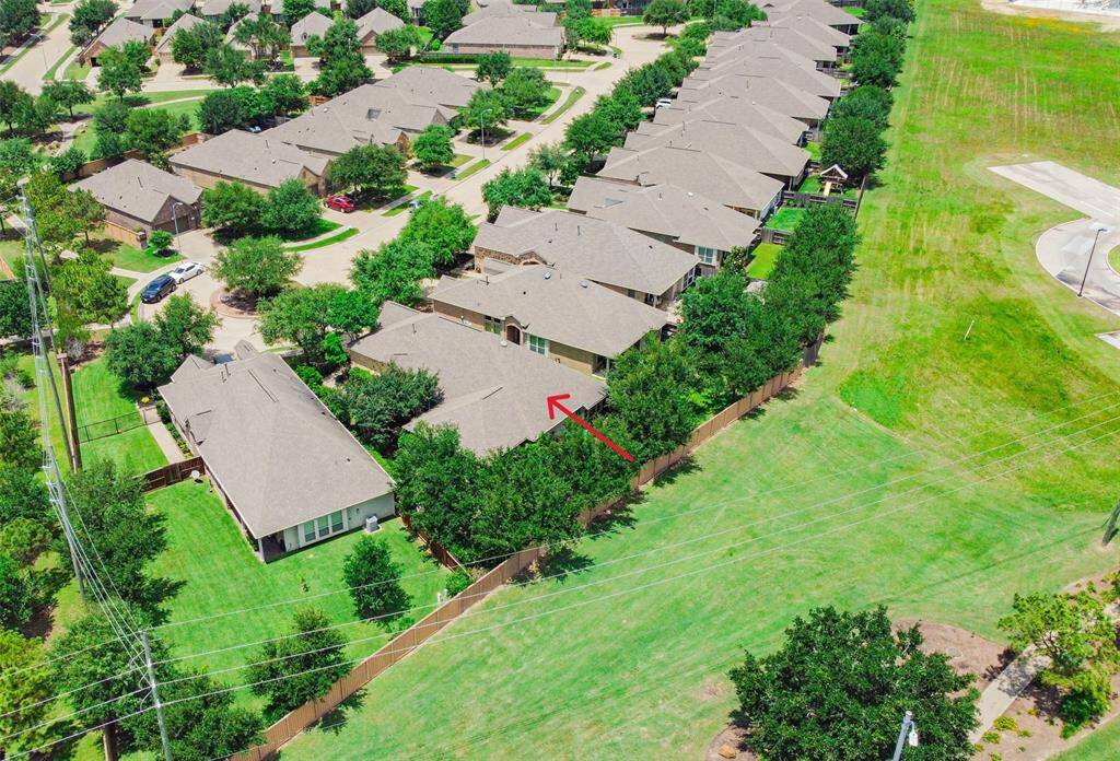 With no rear neighbors, this home backs to a greenbelt, providing an extra layer of privacy and a natural backdrop.