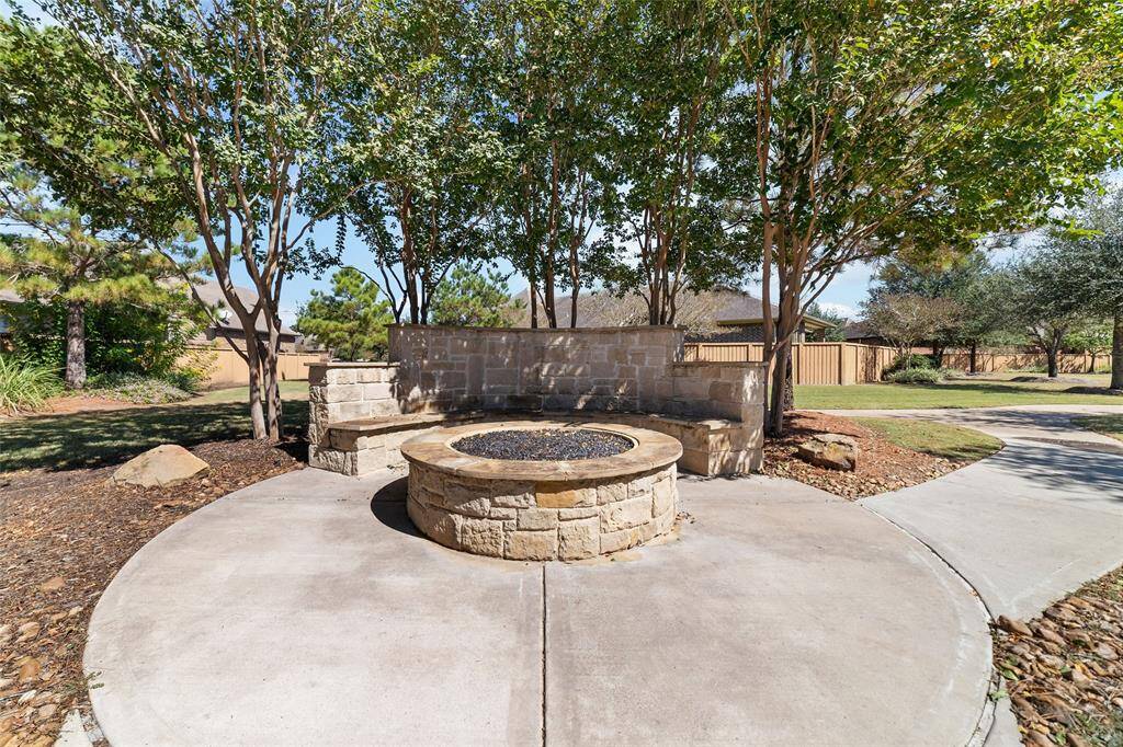 Reserve this inviting space, complete with a cozy stone fire pit—perfect for relaxing or entertaining under the stars.