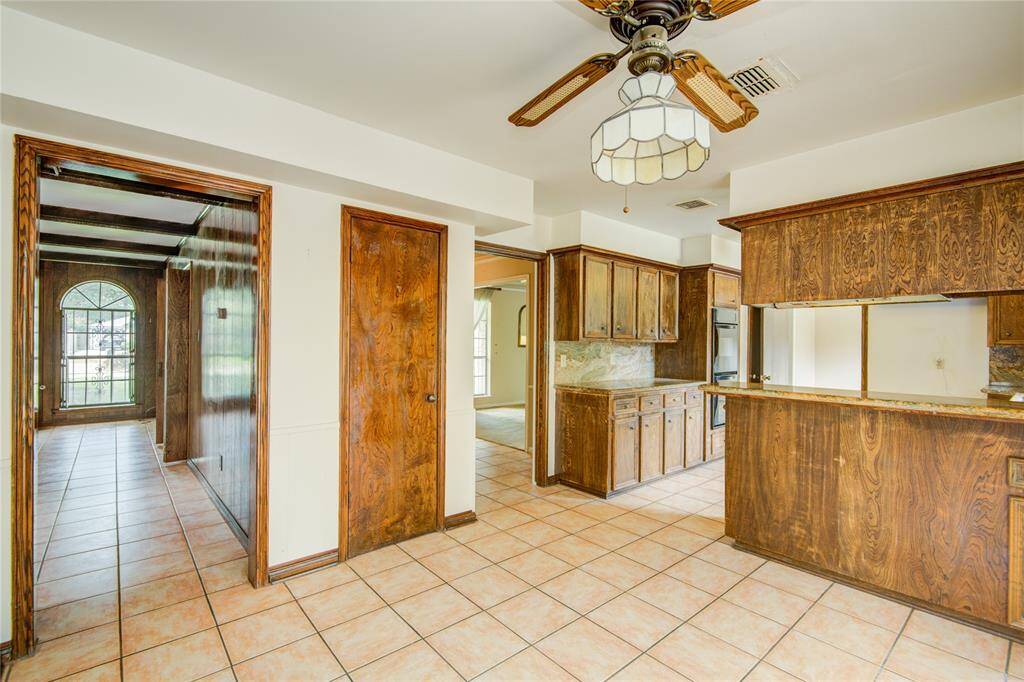 From the breakfast area you cansee how open the home is, offeringmany places to entertain.