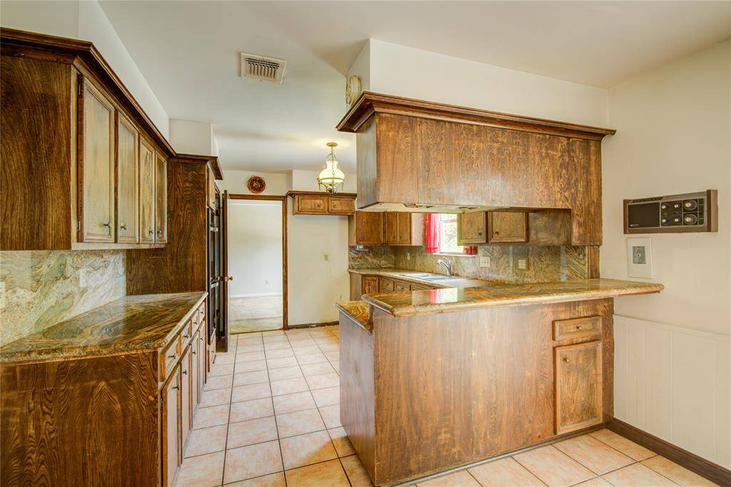This kitchen view reflects the bellybar with added storage.
