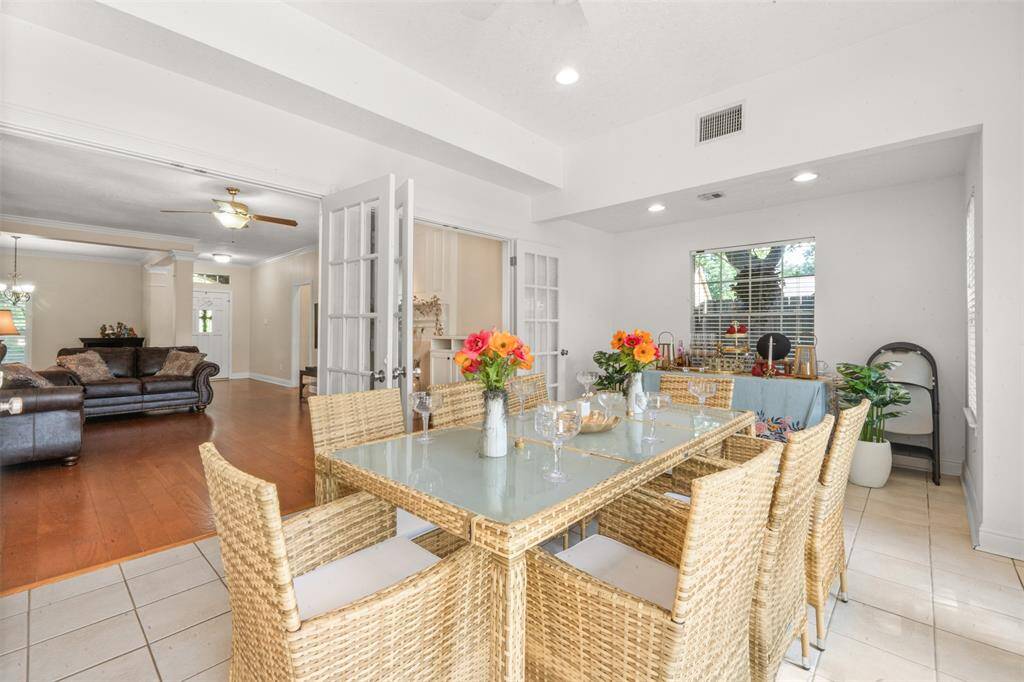Now off to the spacious sunroom.  Plenty of natural lighting - perfect for enjoying outdoors inside.