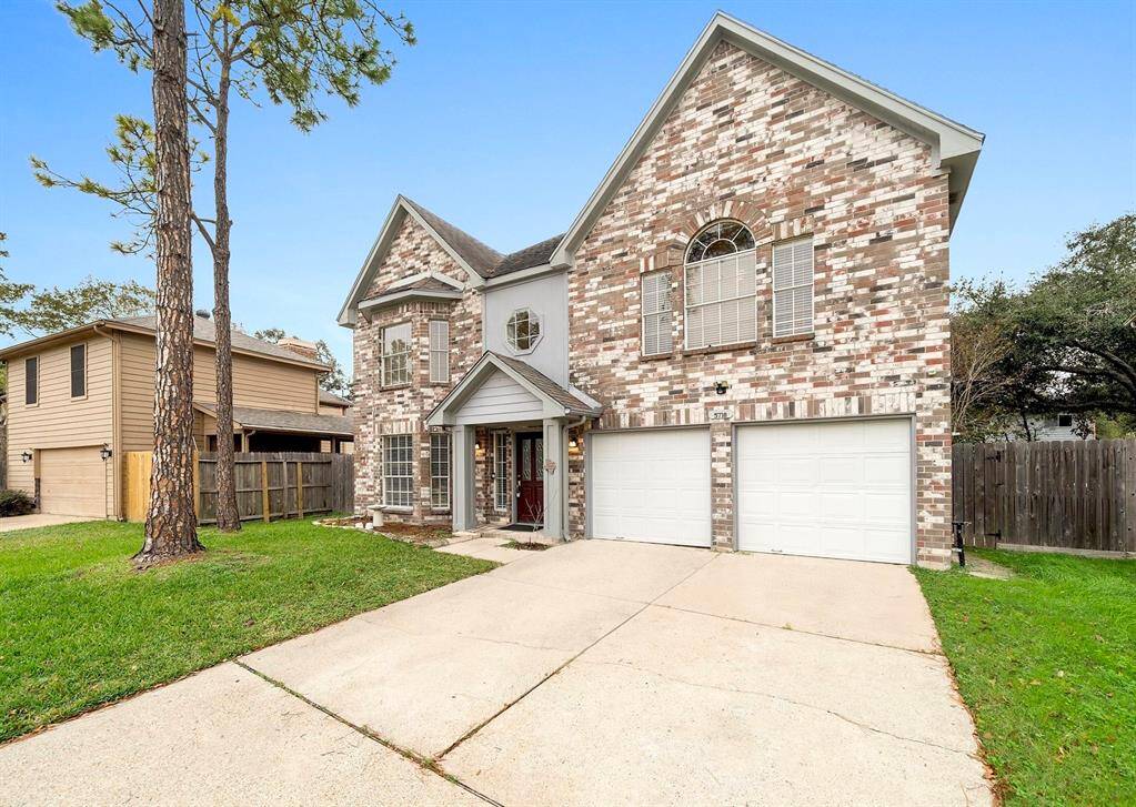 Nestled in a serene community, this stunning two-story, four-sided brick home boasts timeless curb appeal with a charming front porch and lush landscaping.