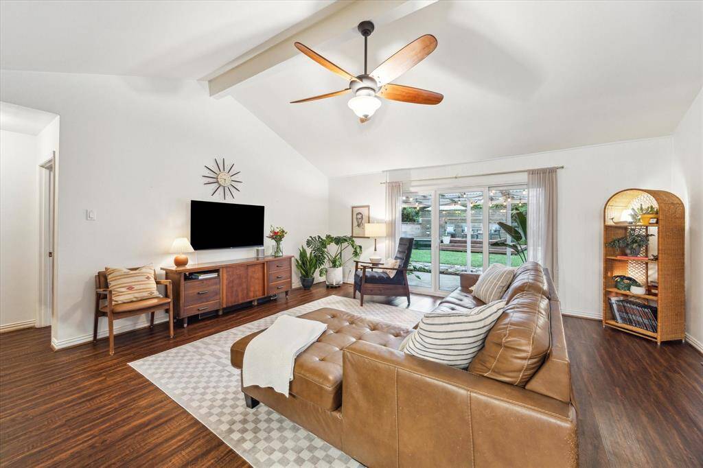 The Kitchen has views of the Backyard and is open to the Family Room on the back of the house