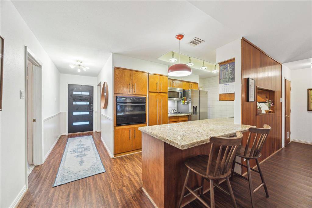 Formal Dining Room on the front of the house with an abundance of natural light and architectural details