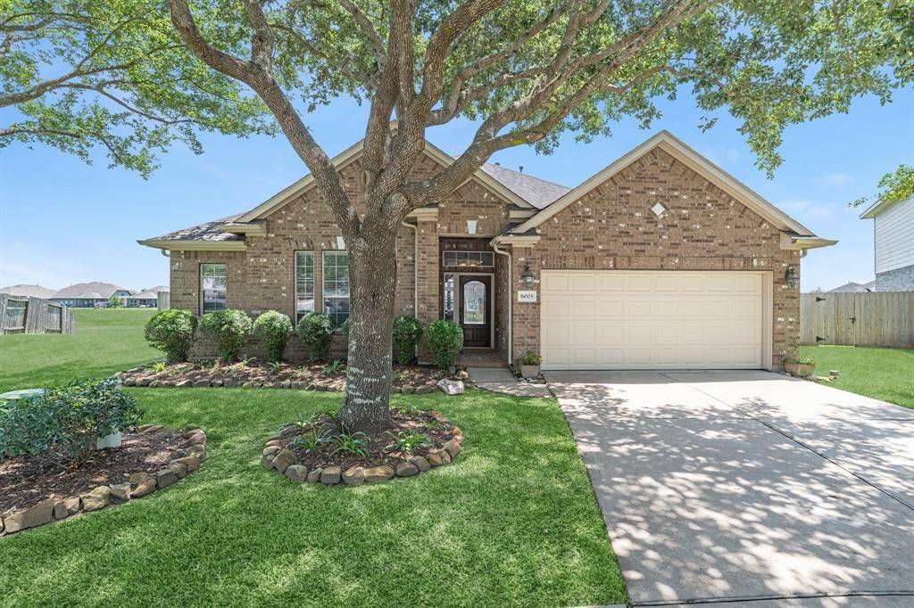 Welcome to 6003 Oxford Lake! Located on a semi-cul-de-sac with one of the biggest lots in the community.