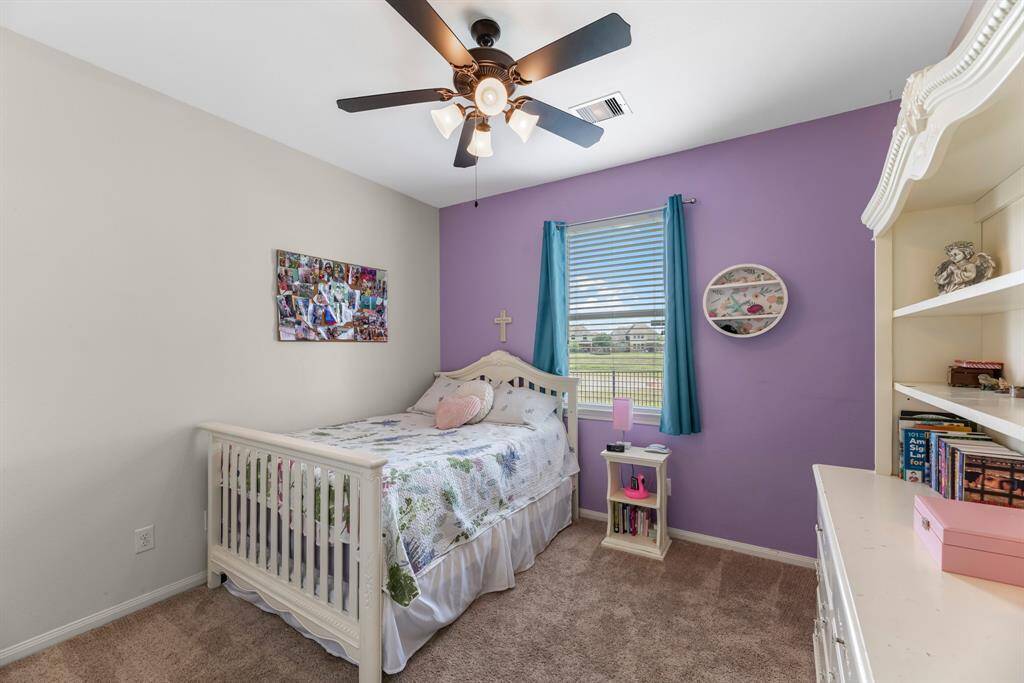 Second bedroom located opposite side of the primary bedroom between the living room.