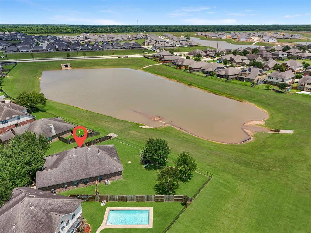 Aerial view of the property and the back yard.