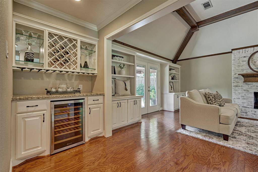 Elegant beverage cooler with chic storage for your entertaining needs.