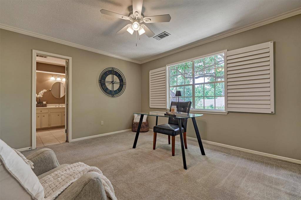 This room also features direct access to the large hall bath.