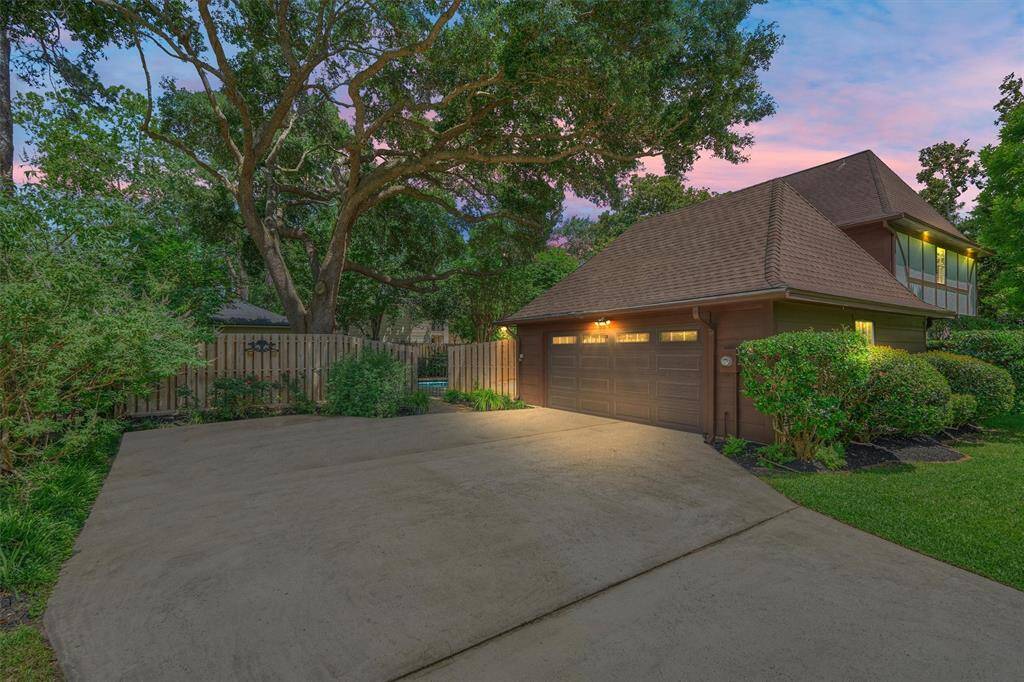Wide, level private driveway for easy access.