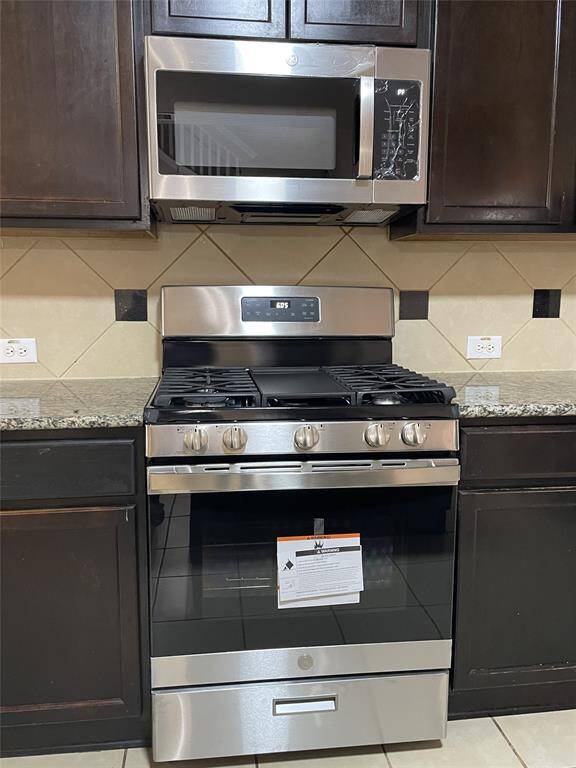 Brand new 5 burner gas range and microwave