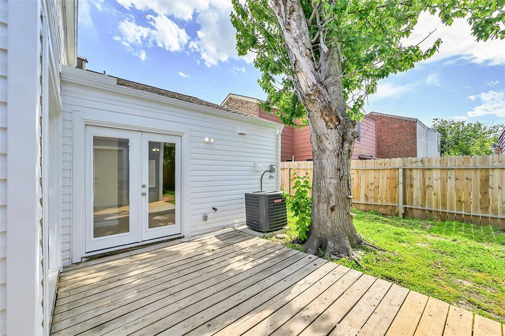 This serene outdoor area features an open, well-maintained yard, offering plenty of room for landscaping, entertaining, or creating your own backyard oasis. It's the perfect setting for relaxation and outdoor enjoyment.