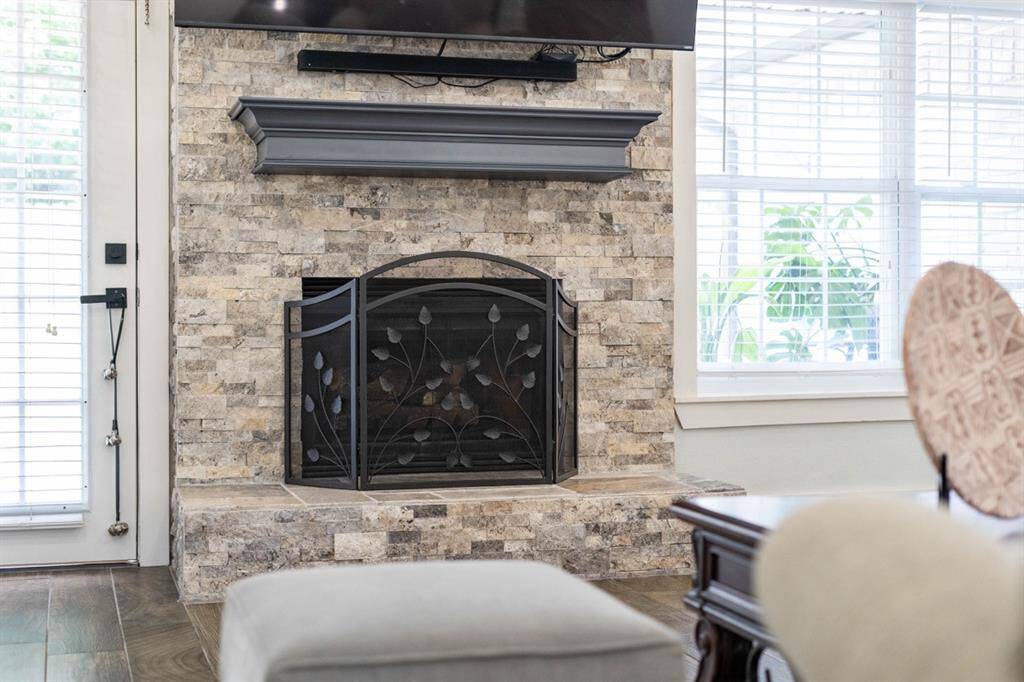 Beautiful stacked stone fireplace with mantel!