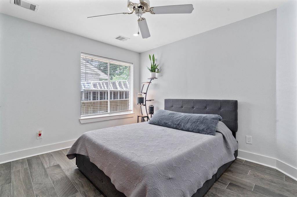 This is the fourth bedroom, also spacious, equipped w ceiling fan and closet.