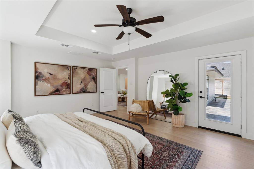 Enjoy easy access to the backyard straight from the primary bedroom.