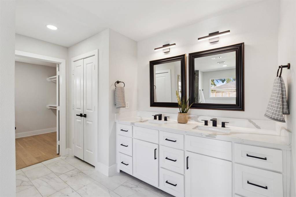 The dual vanities combine style and function, providing plenty of space for two.