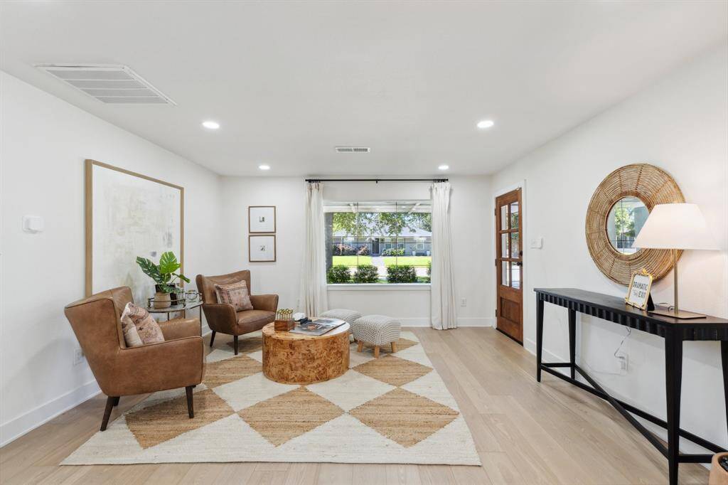 Inside this 3 bedroom single story home, you are greeted by a spacious entry that can serve as a formal seating area, playroom, or additional flex space.