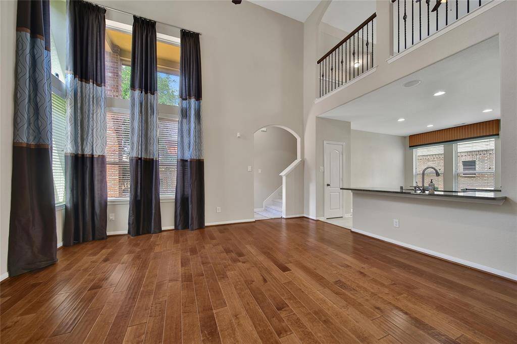 Beautiful wood floors throughout the living room.