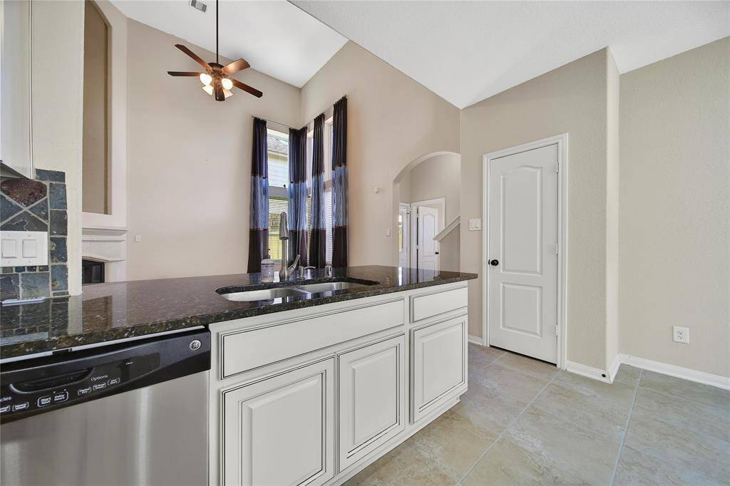 Enjoy granite counters in the kitchen.