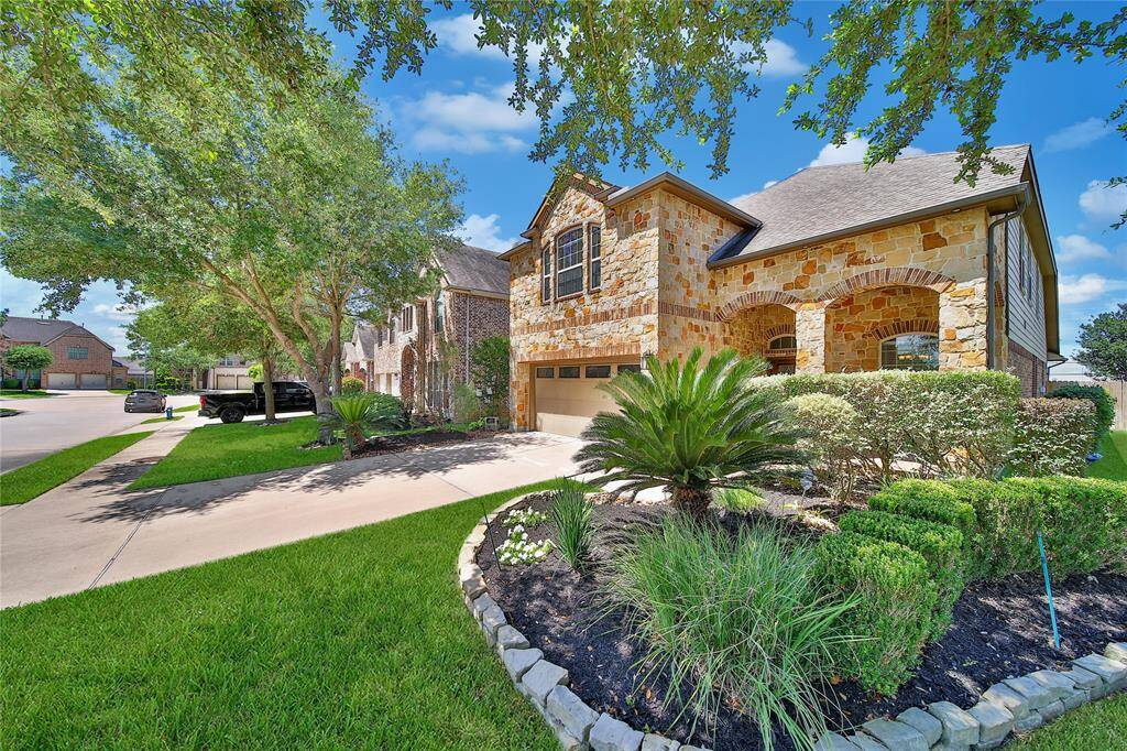 Beautiful landscaping in the front and back.