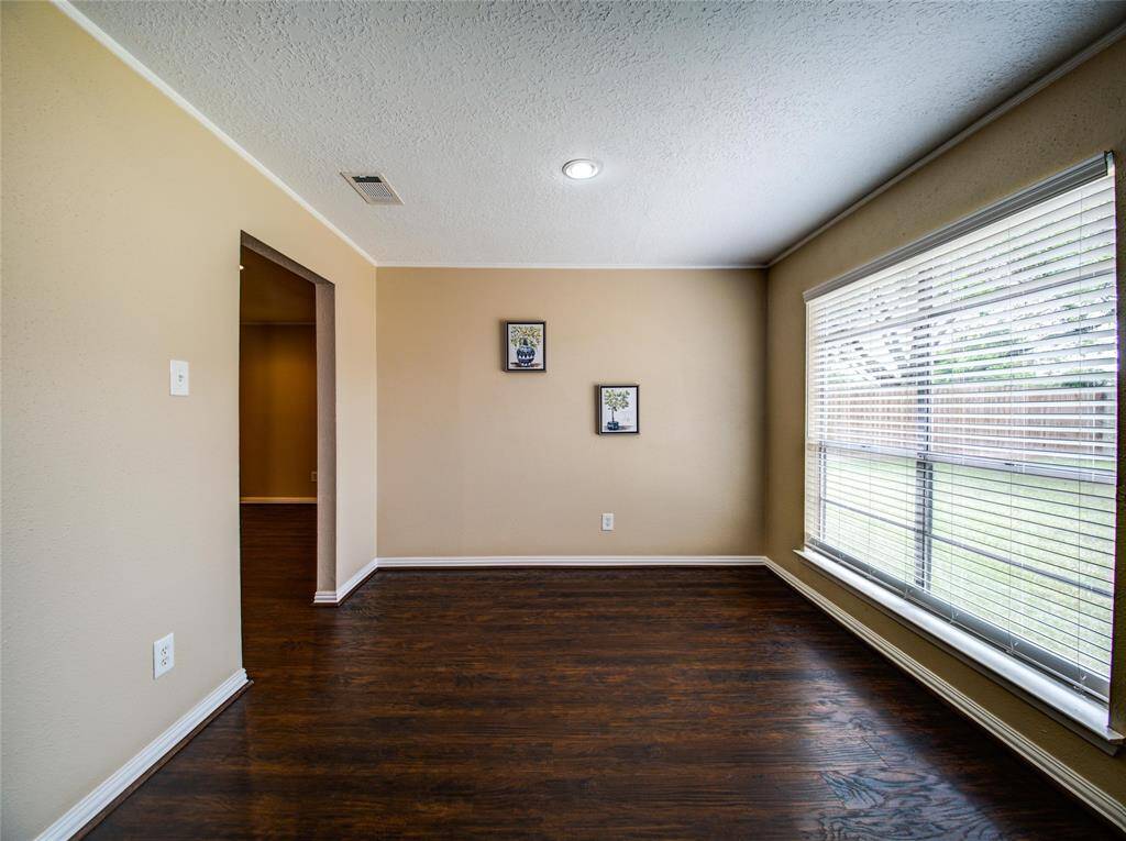 Good-sized dining area filled with natural light.