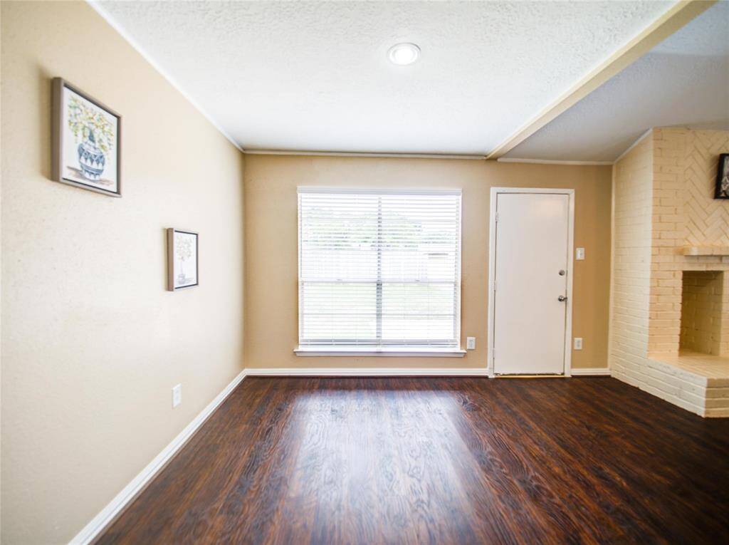 The dining room connects to the back yard via a sliding door.