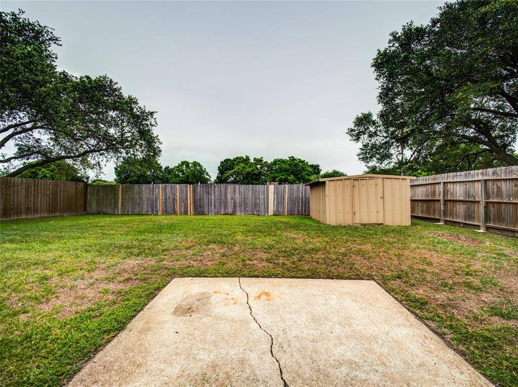 Spacious backyard ideal for gardening and landscaping.